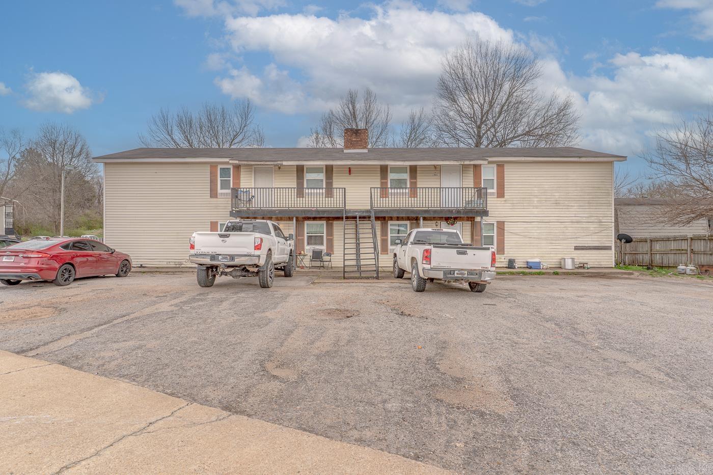 Welcome to the market, a perfect investor opportunity, 1905 Belk St. Jonesboro, Ar. This fully occupied quadplex offers immediate rental income, making it a perfect addition to your portfolio. Conveniently located just minutes from the college and a short drive to downtown, this property is in a high-demand rental area. Each of the four 1,000 sq. ft. units features 3 bedrooms, 1 bath, and washer/dryer hookups. All units have been completely renovated within the last three years, ensuring modern interiors and low maintenance. The HVAC systems are less than 10 years old, and the property has a three-tab shingle roof (age unknown). This turnkey investment is ready to be yours. Seller is also selling portfolio, including 11 single family homes. Don't miss out, Call today!