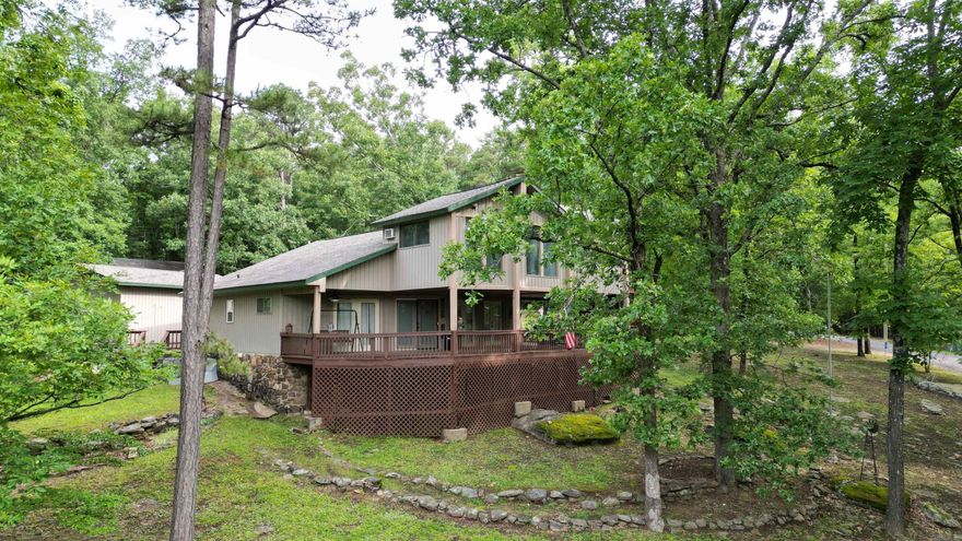 Welcome to lake living in beautiful Tumbling Shoals on Greers Ferry Lake. This 3 bedroom, 2 bath home sits on 1 acre directly across the street from the lake and offers private access to a boat ramp for endless days on the water. Enjoy peaceful lake views from the oversized front deck that stretches across the home where you will find the perfect place to relax, entertain or unwind after a day of boating and fishing. Property includes a shop for space to store your boats and lake toys and parking for family and guests. Whether you are searching for a full-time residence, vacation getaway, or investment opportunity, this home offers the perfect setup. All offers are welcomed! Agents see remarks.