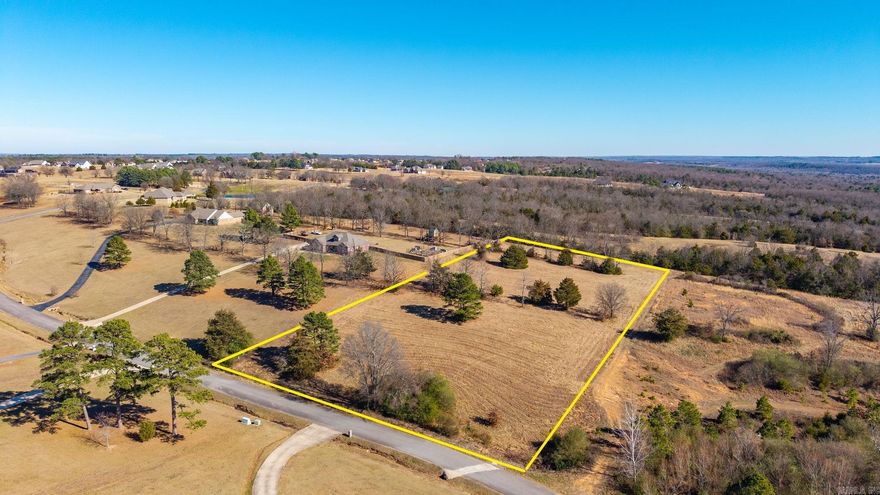 It is very hard to find a lot of this size in Greenbrier. This one is ready to build your dream home. Located in an established and sought after subdivision. The lot slopes up from the road but is flat at the top and has privacy with a tree line at the back of the property. It will be the perfect lot for your new home. 2000 sq. ft. minimum house size.