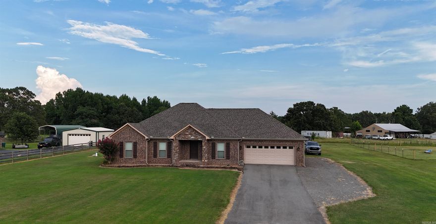 RURAL LIVING AT ITS FINEST!! Check out this gorgeous 4BR/2BA home that sits on a level 1 acre lot. This home has so much to offer, from the wooden beams in the living room, to a spacious master, concrete floors and a kitchen that is perfect for entertaining and being around the family. This home even has a new storm shelter for those stormy nights. If you are looking for country living but still close to the amenities of the city, this is the ONE! Call me today!!!