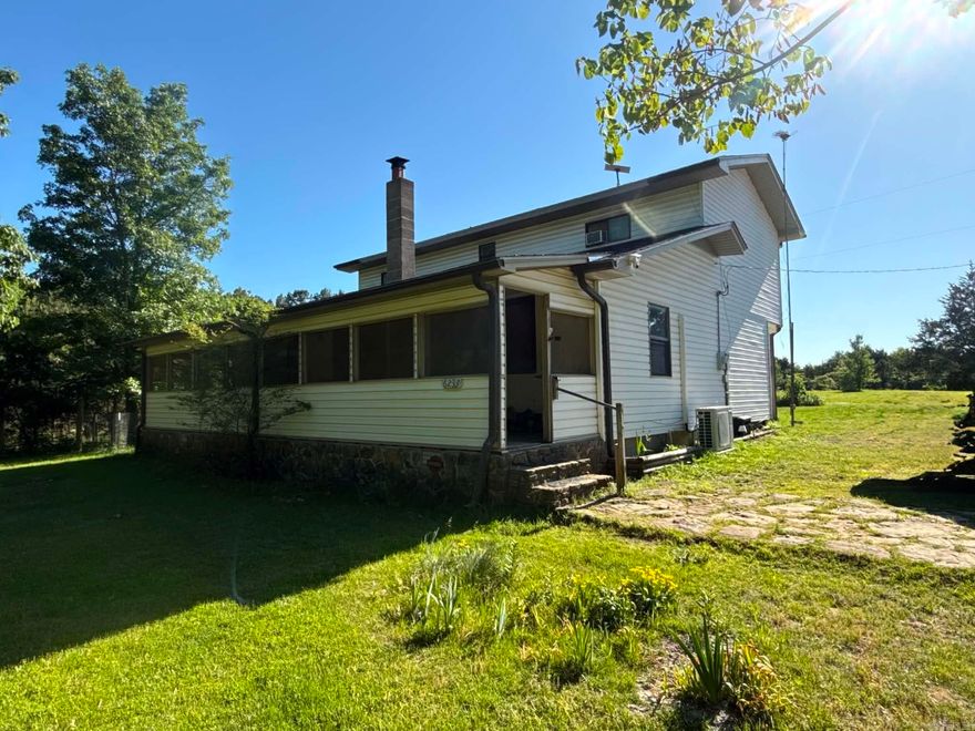Situated on 12.5 acres just outside Mountain View, this 3-bedroom, 2-bath home offers a private setting with a mix of wooded and open land. Located along the boundary of Mountain View and Rural Special school districts, it provides added flexibility for buyers.  The home is 2000 sq ft with a great two-story layout, with the main living area, kitchen and one bedroom on the main level and the other bedrooms located upstairs.  Recent improvements include a new roof (Dec 2025), updated kitchen and downstairs bath, new flooring and subfloors, updated lighting and doors, and foundation work. The home includes a mini-split system (2024) along with propane heat.  Additional features include city water, septic, Starlink availability, and a detached 2-car garage.  The acreage includes a seasonal pond and seasonal creek, adding natural character to the property.  The property is very flat with endless opportunities.