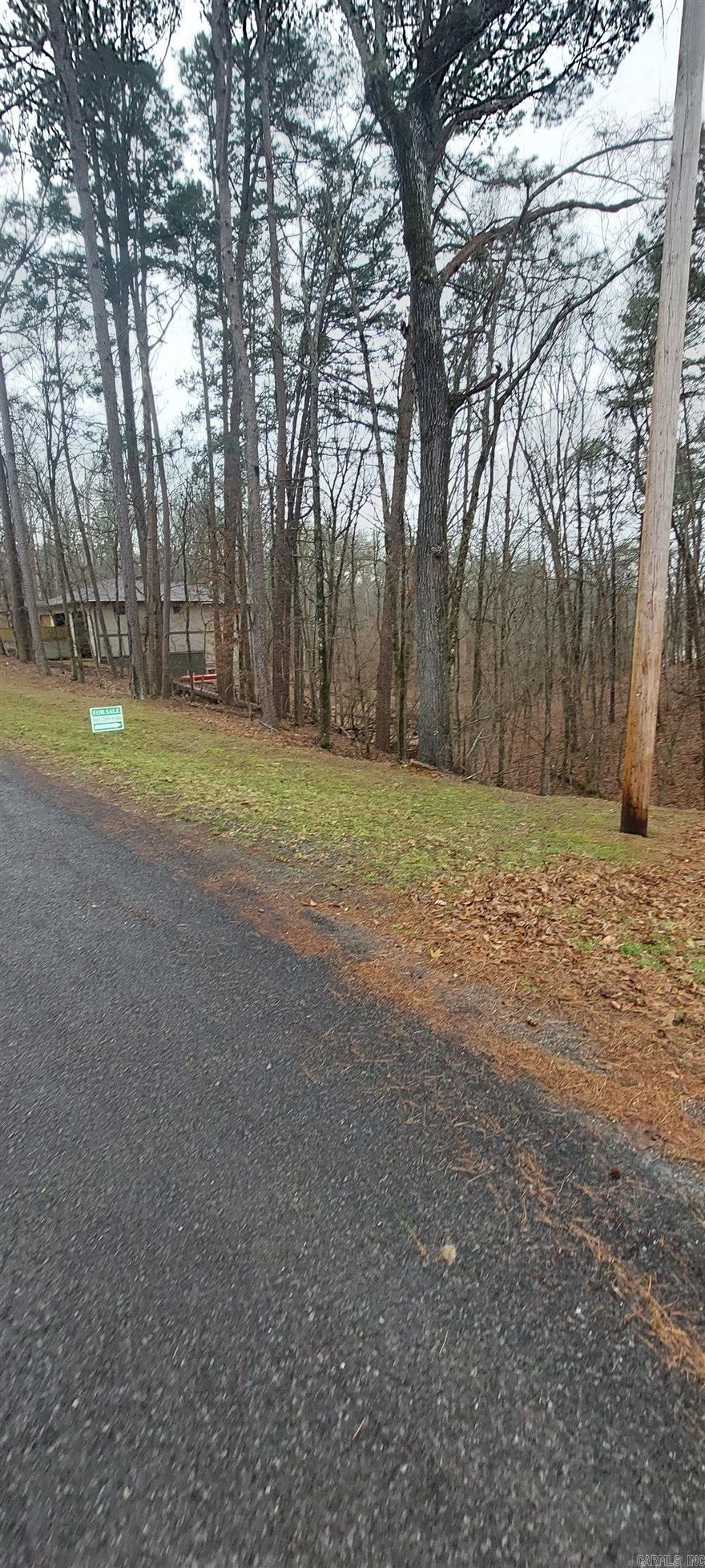 Great wooded lot in the awesome Diamondhead Resort Community. This lot is a great size, just under an acre, and it is close to the lake, golf courses, shopping, and restaurants. If you decide to build a home, the minimum sq ft is 1200.