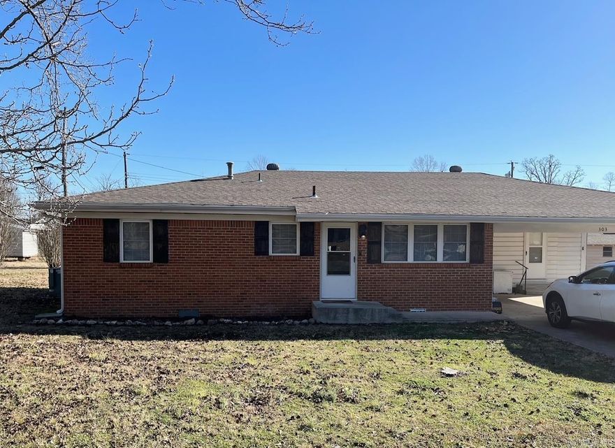 303 Walnut Drive has 3 bedrooms, 1 full bath, and 2 half bathrooms. This charming home has new beautiful vinyl flooring, freshly painted, new lighting in the kitchen, and the roof was replaced in 2018. The spacious 24x30 shop has an overhead door and second level. This well-maintained home is conveniently located near all the great restaurants and shopping centers.