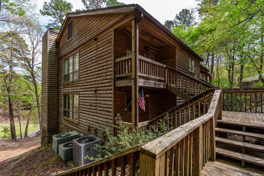 Beautifully updated 2 bedroom, 2 bath corner condo located in the highly sought after Mountain Harbor Resort on the shores of pristine Lake Ouachita. This condo is one of the few 2 bedrooms with an oversidezd back deck (28"x 12"). The condo has been remodeled and updated with many extras: interior doors, light fixtures, granite counter tops in the kitchen & bathrooms, kitchen appliances, the "popcorn" ceiling has been removed and updated, newer LVP flooring in living area, tile in kitchen and baths. Move in ready just in time for lake season.  Nearby you will find two swimming pools, and courts for pickleball, tennis, and basketball. A close walk or drive to the lakeshore and outdoor enthusiasts can take advantage of miles of trails for walking, mountain biking, or ATV adventures. Selling mostly furnished. *Agents see Remarks*