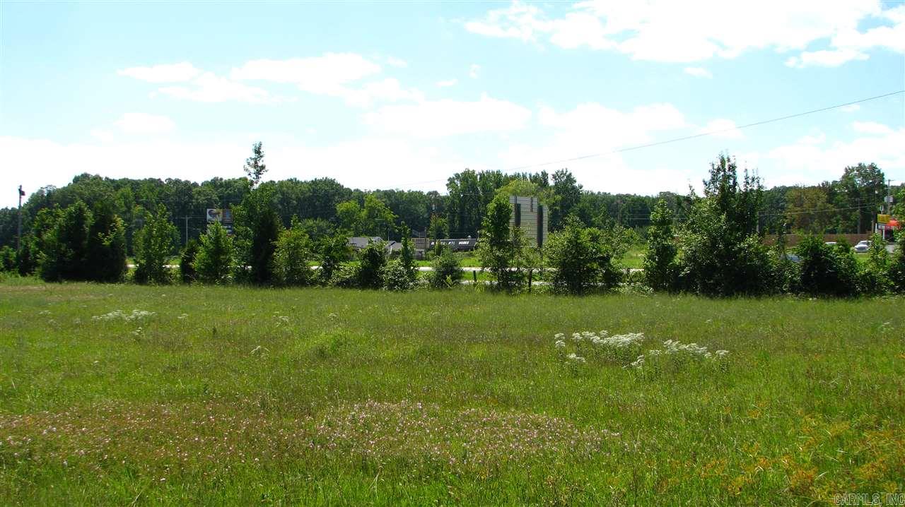 Great visibility from 67/167. 175' of frontage, level and mostly cleared. In addition to this lot, there is 1 more lot available with 3.80 acres. Parcels begin on Southern boundary of Wild Hog Liquor Store and continue to Northern boundary of former Busy Bee location, (now a car lot). City water, commercial zoning in place.