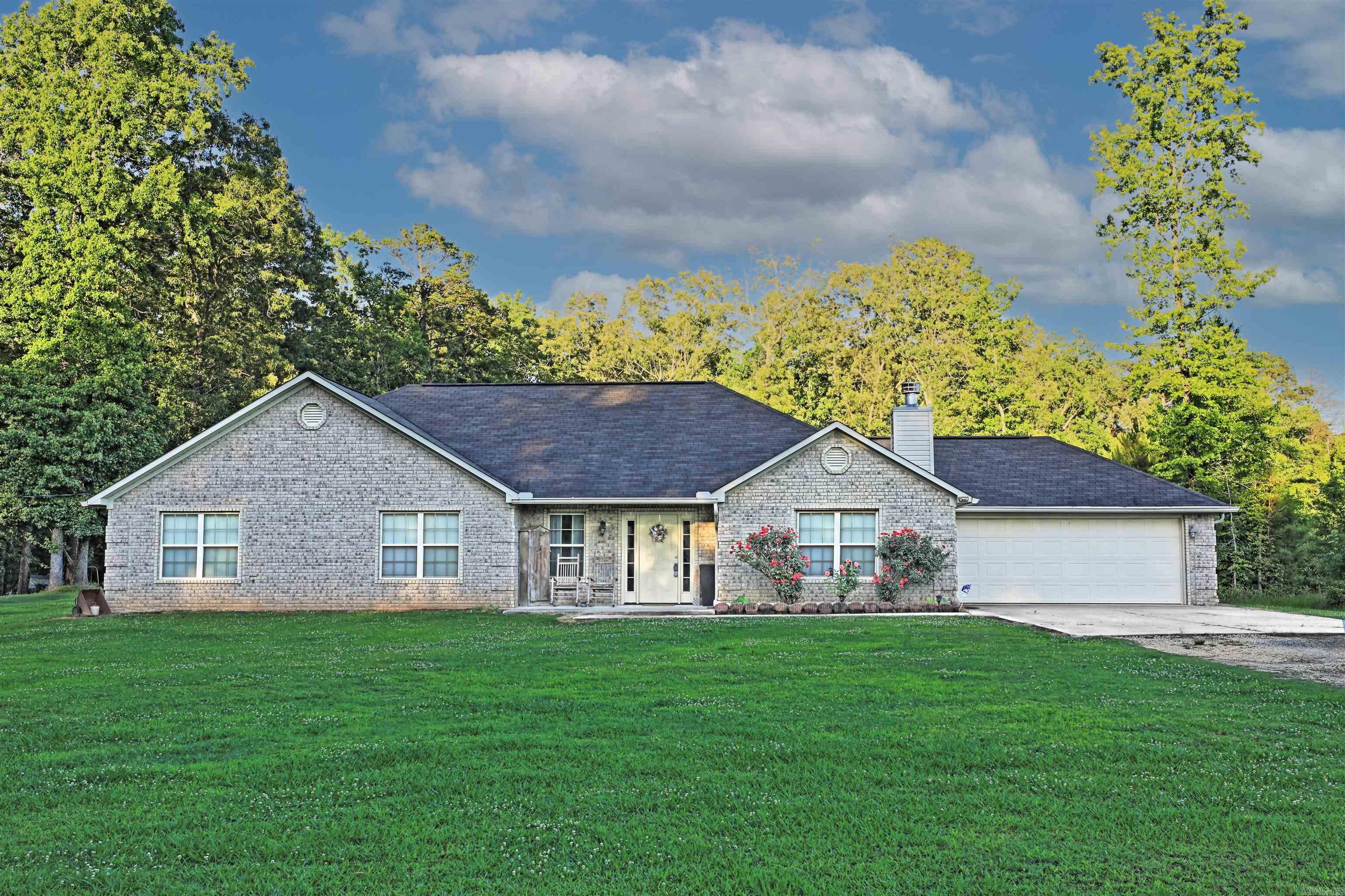 Private Country Retreat on 5 ACRES ā Move-In Ready! Tucked away at the end of a private road, this beautifully maintained traditional-style home offers nearly 3,000 sq ft of comfortable living space, ultimate privacy, and all the extras youāve been looking for. Featuring 4 generously sized bedroomsāincluding an oversized primary suite with a sitting areaāthis home combines space, functionality, and charm. Enjoy year-round relaxation in the enclosed, heated and cooled glass sunroom, or entertain with ease on the patio, perfect for grilling and gatherings. The large dining area flows into an updated kitchen with a new dishwasher, and plenty of space for hosting. Step outside and experience nature at its best with deer frequently visiting the backyard, adding to the serene country atmosphere. The huge, insulated shop is a dream setup for hobbies or entertaining, complete with a mini-split system, full bar/kitchen area, and negotiable home theater features including speakers and a projector for unforgettable movie/football game nights. Additional highlights include updated bathrooms, a cozy living room with fireplace, & a 2-car garage! RD eligible for possible $0 down!