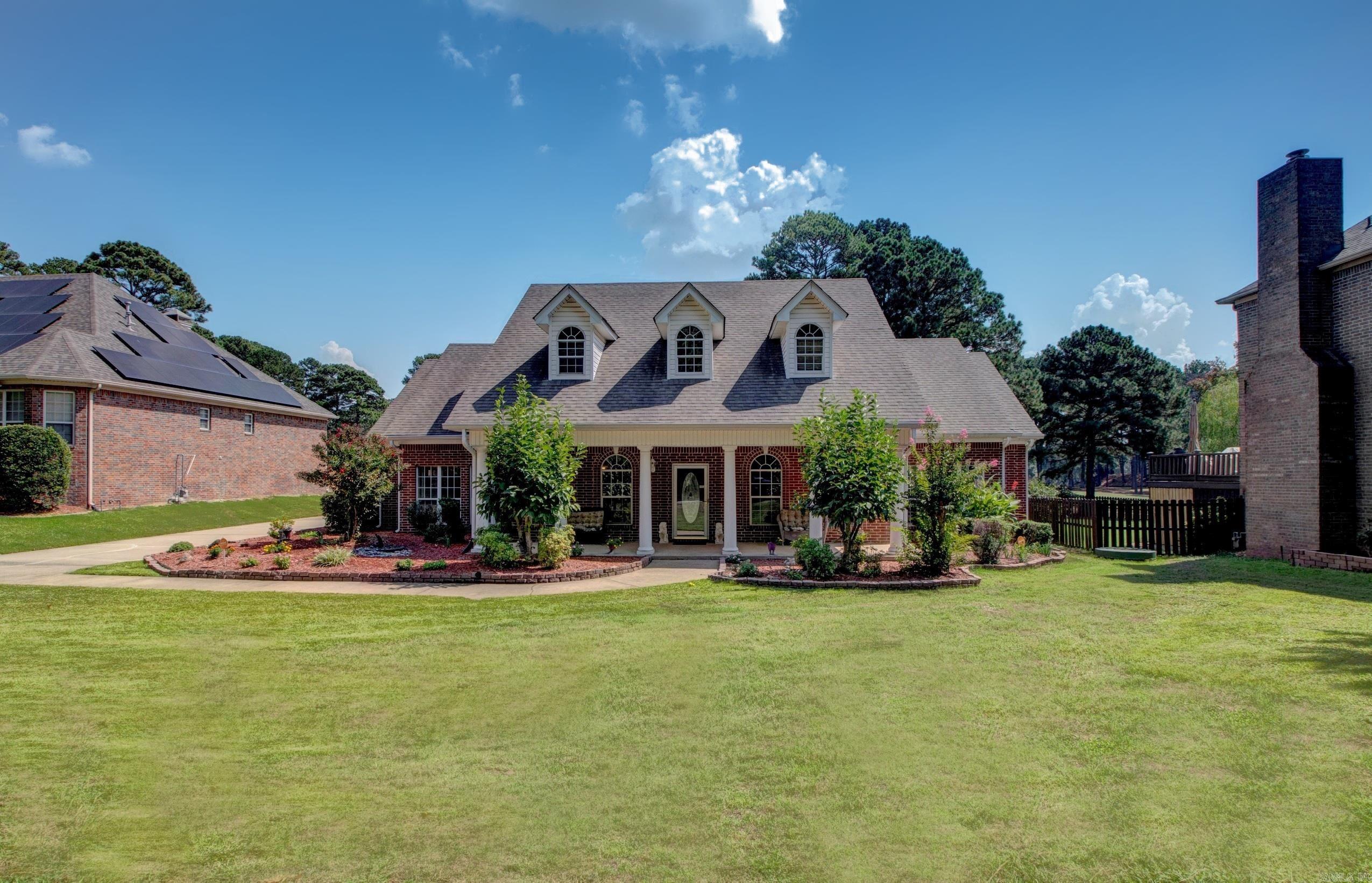 Gorgeous Home in the Lawrence Addition of Maumelle! This spectacular home is nestled on the 7 Hole of the Maumelle Country Club Golf Course. If you're a golfer, this Home is just for you! Home offers a luxurious retreat with plenty of natural light. Enjoy efficiency with 3 water heaters less than 4 y/o and 2 central air units less than 6 y/o. Home features solar panels that result in monthly bills of $1-$13 and an average annual rebate of $80. The cozy natural gas fireplace adds warmth and charm. The main spacious bedroom downstairs has a large walk-in closet, a separate walk-in shower, and a jet-propelled tub. Upstairs has 3 generous bedrooms with 1 having an en-suite bathroom and 2 sharing a convenient Jack-and-Jill bathroom. A central vacuum system for effortless cleaning and a sprinkler system with timer to maintain the lush lawn. This lovely home offers proximity to shopping and retail, blending convenience with refined living. Donāt miss the chance to own this meticulously crafted haven! Come see!