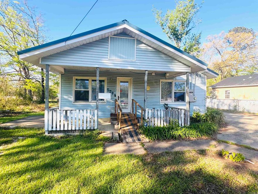 With solid bones and great features already in place, this property is calling all home buyers that are looking to roll up their sleeves and put their personal style and spin on their home or an investor ready for their next renovation project to flip or rent... lots of possibilities with the 3 bedroom 2 bathroom home, vinyl siding, newer metal roof, a 3T Rheem package unit installed in October 2022, concrete drive-way and metal carport, multiple porches, large city lot, this property cannot be missed. Call today!  Property being sold as-is, no property disclosure available. Taxes and acreage taken from courthouse records. Generator does not convey.