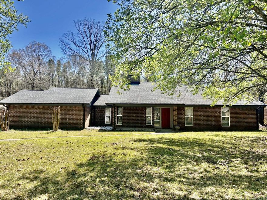 Beautiful home on approximately 0.45 acres! Conveniently located in quiet, well-kept subdivision. Home offers spacious vaulted ceiling living room with a see-thru fireplace into the dining room.  Kitchen has been updated with Corian countertops and new stone back splash.  Home has been freshly painted inside and out and includes new lighting throughout. Large master bedroom with updated bath that offers a walk-in shower and jacuzzi bath.  Home includes new windows, new architectural shingle roof with new guttering, and a spacious backyard.  Call today to setup your private showing!