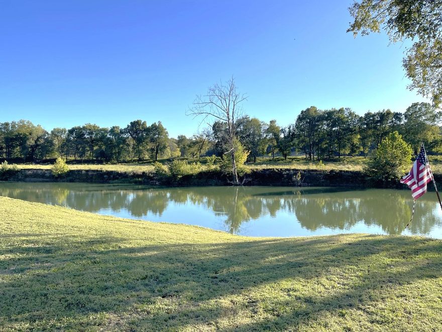 This beautiful property, right on the banks of Spring River, has electricity, with two camper hook-ups!  The lot is approximately 82X100, fairly level, and well-manicured.  Set a chair by the water, throw a line out, and just relax while you wait for the big one to bite! Dip in the water and cool off on those really hot days. Have a campfire at dark for the ones who like smores.  So many family memories are just waiting to be made here!