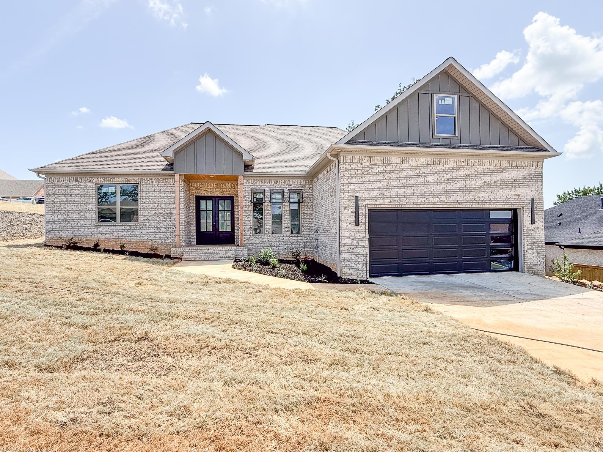 Welcome to this exquisite new construction home in Greystone Subdivision.The home boasts three and a half elegant bathrooms, highlighted by a master bath wet room with dual shower heads and a freestanding tub enclosed in glass, offering a serene spa-like retreat.The gourmet kitchen is a chef's dream, featuring a double oven, custom cabinets, and under-cabinet lighting, all accentuated by a white and gold design. The living room showcases a drop ceiling. The luxurious master suite offers two closets for ample storage, and the spacious 20-foot garage door accommodates larger vehicles and additional storage needs. Foam insulation and foil-back roof decking ensure energy efficiency, while LED lighting provides both practicality and style. The tankless hot water heater guarantees endless hot water. This home is a must-see for anyone seeking a blend of luxury, comfort, and modern amenities. Donāt miss the opportunity to make this stunning property your own; contact us today to schedule a viewing!