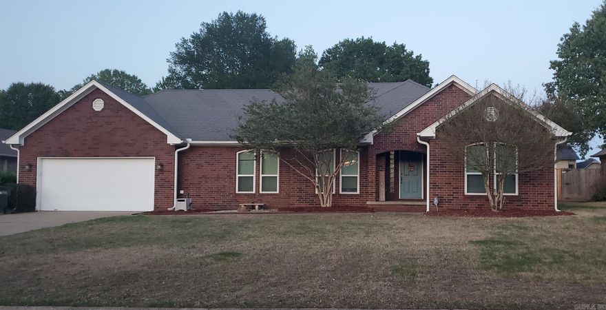 Beautifully updated, move-in ready home in the highly sought after Mallard Crossing subdivision in West Conway.  The home has been updated with stunning hand-scraped acacia hardwood floors, granite countertops, and premium appliances in the kitchen, as well as an updated primary bathroom.  The large, relaxing, covered outdoor living space features cedar trim, LED lights, and ceiling fans.  It is the perfect place to view the large backyard and is just steps away from the in ground storm shelter.  The living room boosts tray ceilings and includes a professionally installed surround sound system.  The home has a split bedroom floor plan.  The primary bedroom has 2 walk-in closets in addition to an en suite with a double sink vanity, large jetted soaking tub and tiled shower.  The other bedrooms each have large closets and plush carpet.  The guest bathroom features a shower/tub combo and a large single sink vanity with multiple drawers and cabinets.  This home has plenty of storage space inside and outside including a large storage area off of the 2 car garage.