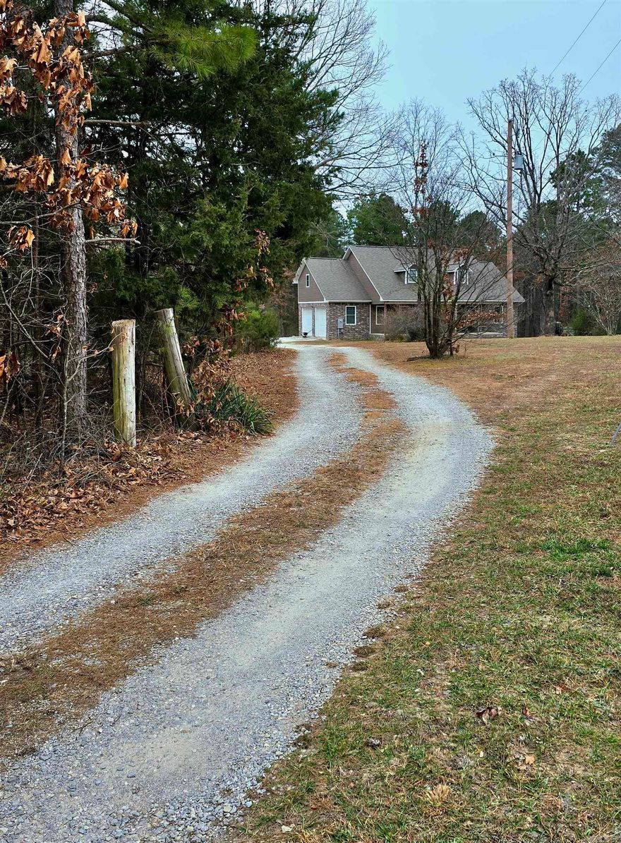 Built in 2020, this beautiful brick, 3 bedroom – 2 bath home with a thermostat control radiant heat floor 2 car garage. Large master bedroom with bay windows, walk in closet and custom-built tile shower with glass doors. Living, dining and kitchen have vaulted ceilings. Open concept kitchen with granite countertop, vinyl waterproof flooring and modern appliances. Home has central heat/air, backup propane wall heater and outside Tyler wood burning furnace. Finished bonus room above the garage, ideal for a home office, studio, or playroom. Perfect set up for a hobby farm with 3 acres of open pasture and plenty of room for animals, gardens, outbuildings and come fenced with web wire. A great opportunity to enjoy country life while still staying connected to modern conveniences.  White River fishing just 2 miles away and shopping at Mountain View less than 3 miles away.