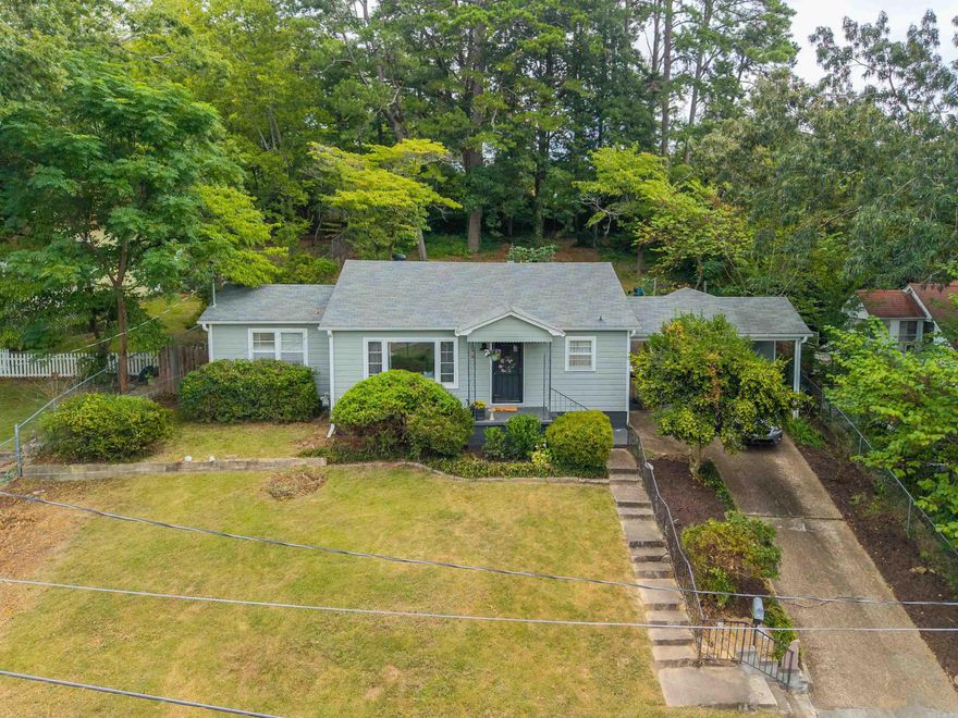 Welcome home to this charming three-bedroom, one-bath bungalow, perfectly situated near the National Park and just steps from the scenic Northwoods Trail. Whether you love hiking, biking, or simply soaking up the beauty of nature, this location is ideal for the outdoor enthusiast.  Inside, you’ll find a welcoming blend of hardwood, tile, and LVP flooring, along with an updated bathroom designed for comfort and style. Recent upgrades include a newer roof (2020), HVAC system (2021), and a tankless water heater, giving you peace of mind for years to come.  The fenced backyard offers plenty of space for pets, gardening, or relaxing evenings outdoors, while the one-car garage adds extra convenience and storage. Best of all, you’re just minutes from the vibrant downtown area, with restaurants, shops, and entertainment close at hand.  This bungalow blends charm, updates, and location into the perfect place to call home.