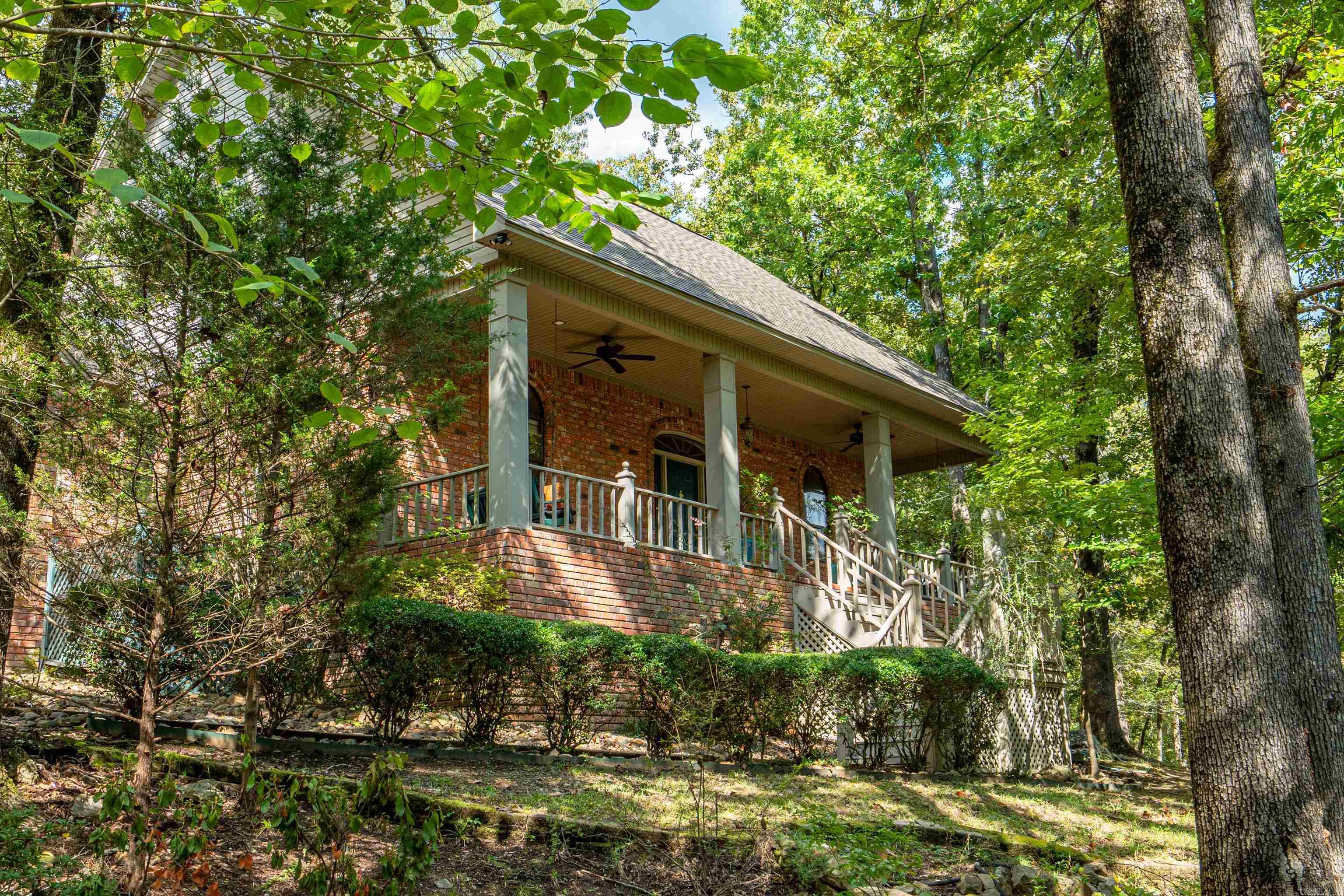Welcome to this charming 4-bedroom, 3-bath home nestled on 4 parklike acres, just one mile from Lakeside School. Blending elegance, comfort, and convenience, this property offers the perfect retreat while remaining close to everything you need. Inside, you’ll find a spacious and inviting floor plan filled with natural light and beautiful hardwood floors. The living room flows seamlessly into the dining area and gourmet kitchen, making it ideal for family living and entertaining. The chef’s kitchen features granite countertops, custom cabinetry, and plenty of workspace. Built-ins throughout the home provide both style and functionality with ample storage. The primary suite offers a relaxing escape with its en-suite bathroom, complete with a soaking tub and separate shower. Three additional bedrooms and two more full bathrooms ensure space and comfort for family and guests alike. Step outside to enjoy the picturesque grounds, with mature trees and lush landscaping creating a private, park-like setting. A 2-car garage plus an additional workshop/garage provide excellent space for extra vehicles or storage, with even more storage available in the floored area above the garage.