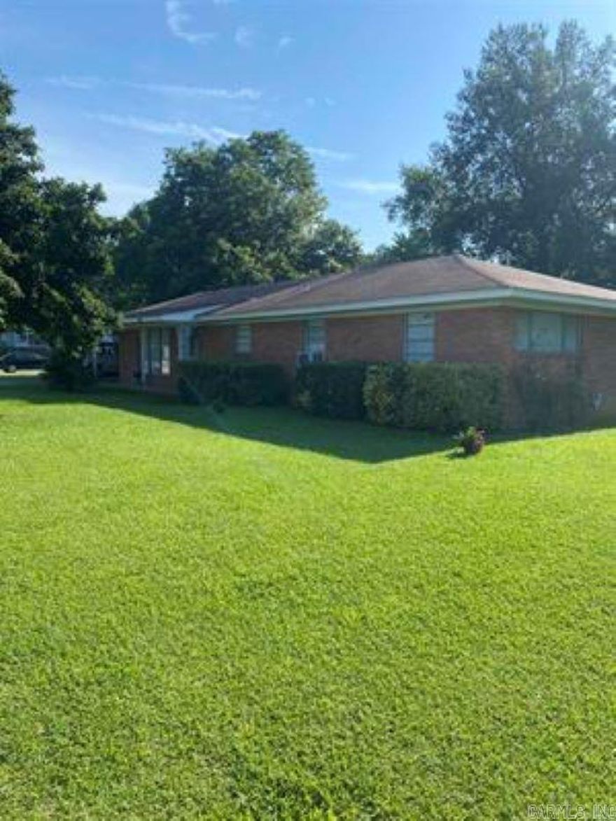 Almost 1/2 acre of .48 of an acre.  Just got the city to approve the replat. Big lot with two lots put together. Great place to put in another house, shop, swimming pool, or garden.  Zoned R-2A.  Home being sold as is.  Home has good bones.