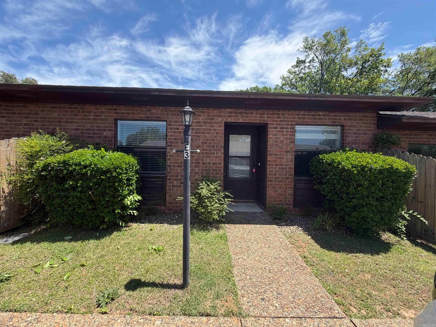 UPDATED 2bed 2bath walk in 1 level all brick condo in super convenient location. NEW paint, LED lights & fans, SS kitchen appliances. Recent flooring updates. Entire complex has a new roof. Quiet area but easy access to Airport Rd & the bypass. Unit comes with stack washer/dryer. Private fenced in outside patio. Super easy living. Big covered pavilion with picnic tables for common use. Swimming pool. HOA fee covers exterior maintenance and grounds so life is easy! THIS LISTING FOR UNIT E3. YOU CAN ALSO BUY UNIT E2 AND HAVE 2 UNITS SIDE BY SIDE. See agent remarks.
