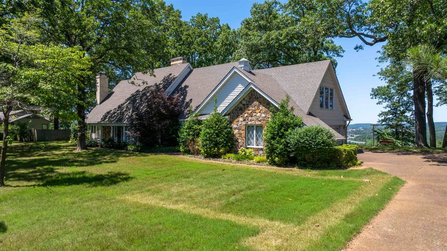 Breathtaking $1 Million Dollar View as the old saying goes! This spacious 2 Story, Approx 4,977 sq ft home with a double lot (North & South side of Dennison Heights totals approx 1 acres) is ready for a new owner. Purchase this home and renovate to apply your own style while enjoying the solid build from its past. This home is laid out with a formal office & library, a true formal dining room, tremendous storage areas in the garage, above the garage, and hidden throughout the home in just about every room so storage will not be an issue. Downstairs is the multi car garage, the formal dining room, kitchen w/view of the city below, breakfast area, large pantry space, guest bathroom, living room, formal foyer w/a magnificent staircase, the library/office, and master bedroom and bathroom. Upstairs are the guest bedrooms and guest bathrooms as well as the craft/bonus spaces too. You really need to see the space to appreciate just how well laid out the home plan is. SEE AGENT REMARKS. The home also boasts a whole home natural gas powered generator and two Trane HVAC units plus gas furnaces. This home has been well cared for and is a solid structure.