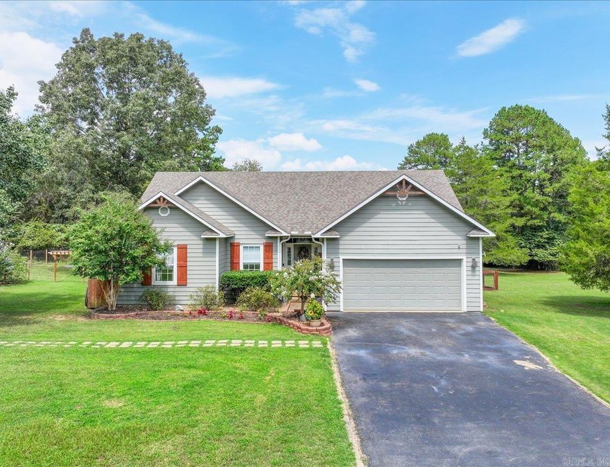 Charming 3Bd/2Ba Home on 1.54 Acres – Lake Hamilton School District – Outdoor Living, Chicken Coop & More! Welcome to your own slice of country paradise in Pearcy, AR! Nestled on 1.54 level acres in the highly sought-after Lake Hamilton School District, this beautifully maintained 3-bedroom, 2-bathroom home offers the perfect blend of comfort, space, and functionality. Step inside to find a warm and inviting interior with an open-concept layout, gas-log fireplace, beamed & vaulted ceiling in living area, and updated LVT flooring. The kitchen features granite countertops, stainless appliances, and custom-tile backsplash. Outside, enjoy the ultimate outdoor living space, complete with a mounted outdoor TV, perfect for watching the game or movie nights under the stars. The spacious yard is ideal for kids, pets, and gatherings — and don’t miss the chicken coop ready for your feathered friends or homesteading dreams! With plenty of room to garden, play, or simply relax, this property offers the peace of country living just minutes from town amenities. Don’t miss your chance to own this unique property in a great location — schedule your private showing today!