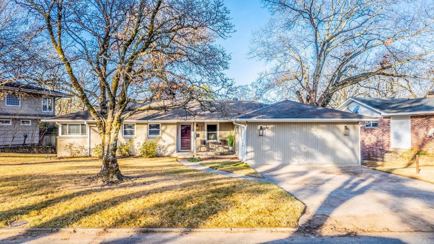 Serenity abounds in this home that feels like a cozy cabin with a lake view. Wood ceilings and beams in the living create a warm retreat in the middle of quiet Lakewood. 2 minutes to shopping, restaurants and outdoor activity and the interstate. Look out from the covered deck with a view of Lake #3 and the fountain. Beautiful wood paneling throughout the home. Chefs will appreciate the Viking stove in kitchen and separate dining area. Small sitting area in kitchen as well. Big bonus room. Pella windows, New HVAC in 2023, new Dishwasher 2024, new hot water heater 2022, Electrical breaker box 2021, Sprinkler system 2017, Vapor barrier 2024, Lakewood Elementary is blocks away and new Middle School is very close by. Hot tub not warranted.