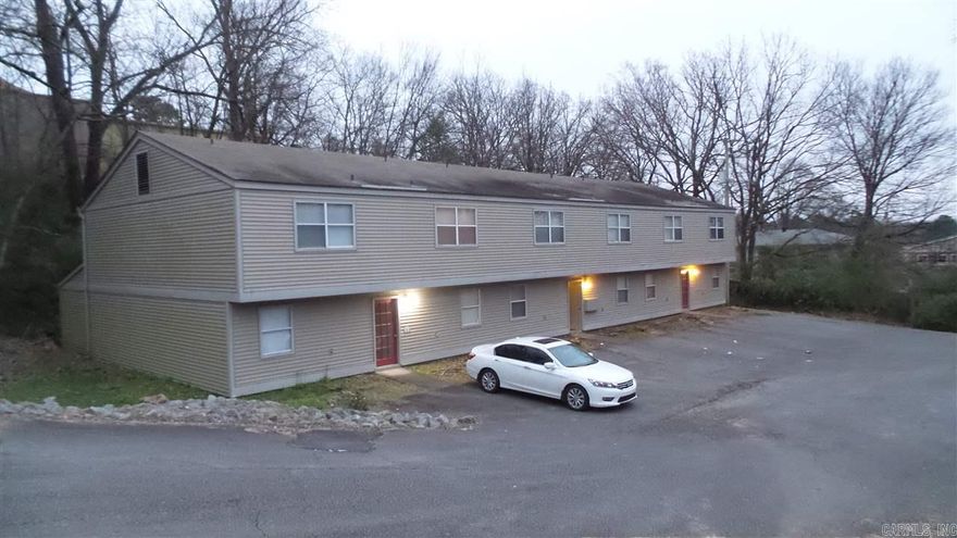 All information available at Deaton Group Realty dot com under the rentals tab, including self-showing instructions & application. Do not call agent. Go to website. This 2/1.5 apartment is located just off Cantrell and Mississippi, you can easily get to all Little Rock amenities in the area including shopping, dining, entertainment, etc. Unit has new paint, new carpet and new luxury vinyl tile flooring. Refrigerator included. Downstairs: living room, kitchen, fireplace & half bath. Upstairs: 2 bdrms/1 bath.