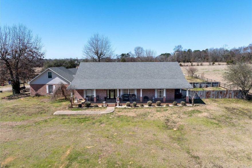 Poultry operation offers (2) 40x500 broiler house farm, current Tyson contact.  Houses have new insulation in walls and ceilings, cool cell curtains, new wires, added fans, LED bulbs, rural water and well water. Litter shed, 100,000 KW Generator, and propane tank. Additional established pad with electricity and water set up for third house. Situated on approx 60 acres, pond, wet weather creek and highway frontage, offers a custom brick home with over 3,320 sq ft of living space, 5 bedrooms and 3 full baths.  Double garage, covered porch, safe room, and newer roof. Geothermal heat/air unit and fiber high-speed internet.  Contact our office for more details.