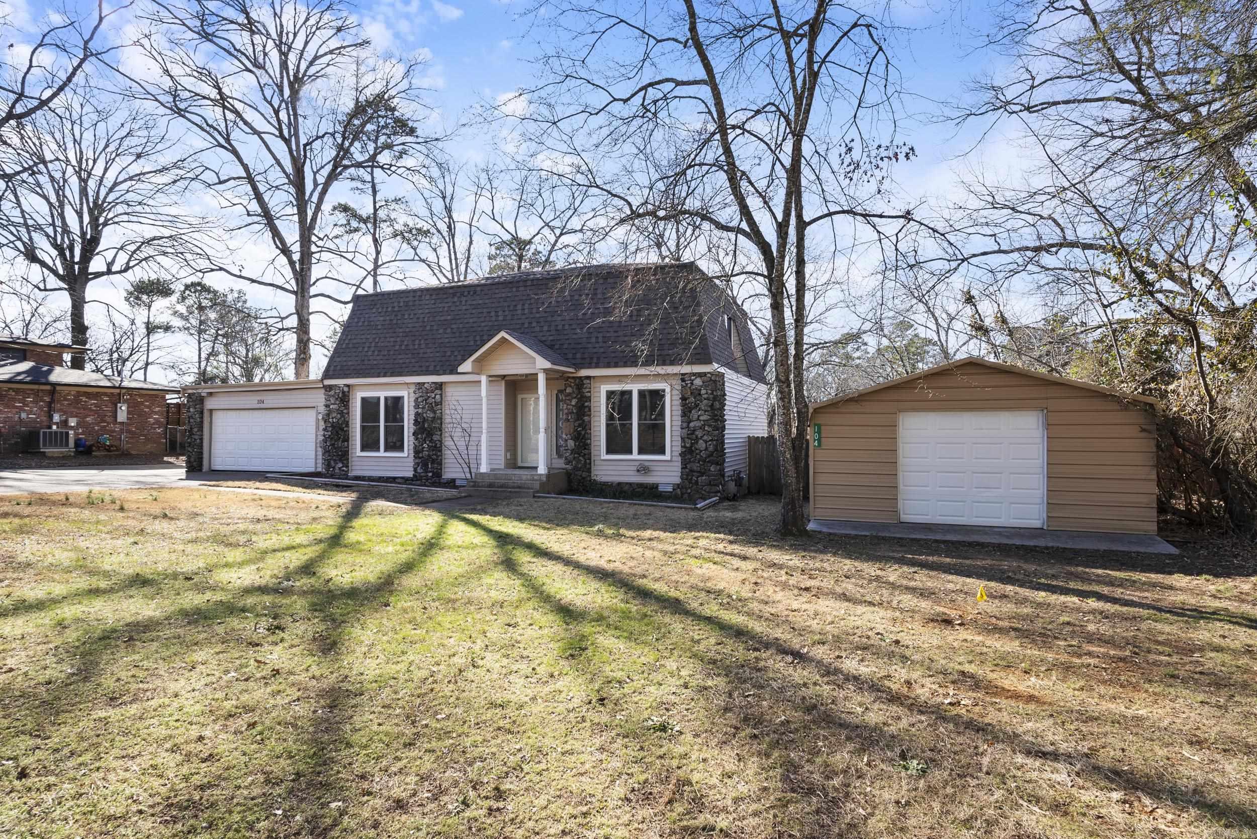 Absolutely beautiful Lake Hamilton Home. This spacious 3-bedroom, 2.5-bathroom home offers a thoughtful layout for comfortable living in the heart of Hot Springs. It features two large living areas, one with a beautiful brick fireplace, and a kitchen with stainless steel appliances and granite countertops. Upstairs, the primary suite includes its own fireplace and en-suite bathroom. Two more bedrooms and a bonus room that serves as an office, playroom, or hobby space. Situated in a peaceful setting across from the Lake Hamilton, this home offers easy access to nature, fishing, and outdoor recreation. Additional perks include an attached garage for two cars and a detached garage/shop that could be use for golf cart garage or extra storage/workspace. Don’t miss this chance to own a home in one of Arkansas’ most charming and sought-after areas at Lake Hamilton. Schedule your showing today!