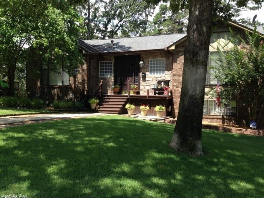 Centrally located with absolute charm and character!  Beautifully updated and move in ready.  Granite Counter Tops and Stainless Steel Appliances.   New hand scrapped engineered laminate flooring, Fresh Paint throughout, Crown Molding and trim work in every room.  New French Doors from Kitchen to Deck, walk-in closets in all bedrooms, 2 jetted tubs and Beautiful Rock Work!  In-laws quarters, new expansive landscaping and sprinkler systems front and back yards.    AGENTS SEE REMARKS