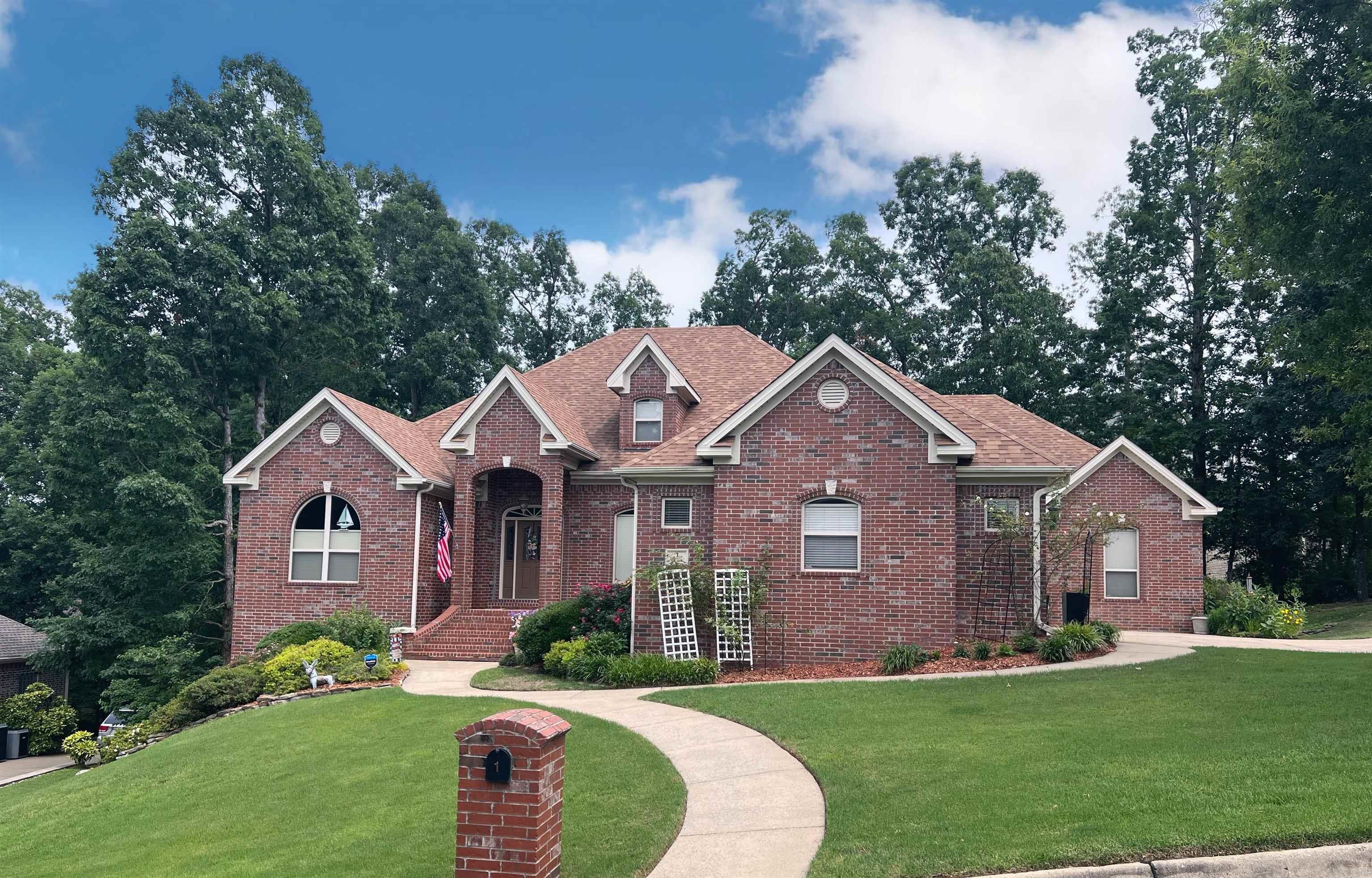 All-Brick 4BR/3.5BA in Sought-After Woodlands Edge! Spacious and well-maintained, this home features all bedrooms on the main level in a split-bedroom layout. Large primary suite includes a sitting area and en-suite bath. Upstairs offers a big bonus room plus a floored walk-in-attic with ample storage. Dedicated office space, screened-in porch, and a 3-car garage. Additional shop/storage area with exterior entrance. Seller offering a 1-year American Home Shield Gold Warranty. Located in beautiful, established neighborhood with access to walking trails and green space, and more!