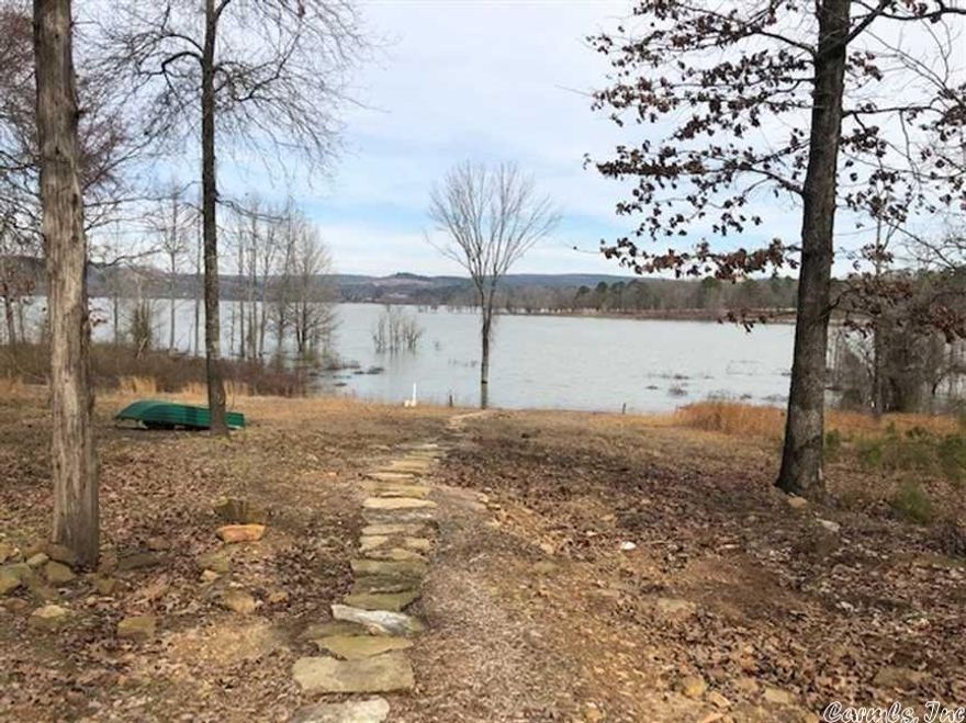 Lot 2 of Memory Lane Estates may be the most affordable lakeview and lake access lot along Greers Ferry Lake! City water and electricity on site. Paved road maintained by city. Every lot has passed a preliminary perc test for a septic system. Residents have access to lake by walkway. Imagine the convenience of being able to tie up your boat at the waters edge to allow your family to come aboard, or being able to go ashore to eat your lunch in your own home. Check out this amazing lot before it's gone!
