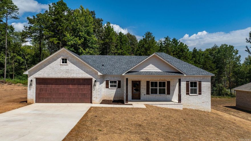 This house has all the extras! Great curb appeal! Inside you will love the open concept living and kitchen with an amazing walk in pantry! Quartz countertops in the kitchen, stylish backsplash and large island. Luxury vinyl flooring throughout. Primary bedroom with vaulted ceiling. You won't even mind doing laundry in this bright laundry room with lots of cabinets and a countertop for folding clothes. The closets have custom shelving with shelving that can be moved to fit your needs. You won't find another home like it.