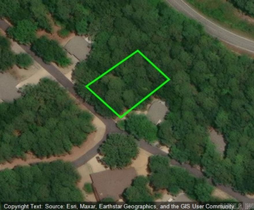 Wooded and build-ready, this premium lot in Hot Springs Village offers the perfect setting for your dream home just steps from premier recreation. Located only .03 miles from Ponce De Leon Golf Course, enjoy easy access to one of HSV’s most beloved fairways and scenic views. Ideally positioned near the West Gate, you’re also close to abundant amenities beyond the gate, including shopping, dining, medical services and more. Surrounded by mature trees and natural beauty, this private parcel combines convenience and country charm in one of Arkansas’ most desirable resort-style communities. Don’t miss your chance to secure this exceptional location!