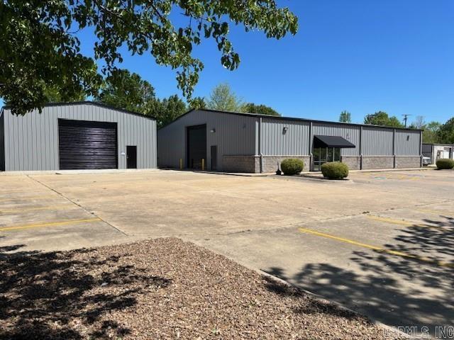 Discover an exceptional opportunity for industrial and manufacturing investment with this impressive property. Boasting a well-maintained total 7,040 SF buildings constructed in 2004 and 2020, this prime site is ideally suited for a range of industrial uses. Zoned C-3. PROPERTY HIGHLIGHTS -Drop down electrical with pre-plumbed air supply plumbing. -Full climate control in main warehouse. -Warehouse 2 Heated with full foam insulation. -Zoned C-3 for flexibility -Ideal for industrial/manufacturing use -Showroom/Waiting/Office area with Bathroom -Shop Bathroom separate. -New painted exterior and awning.