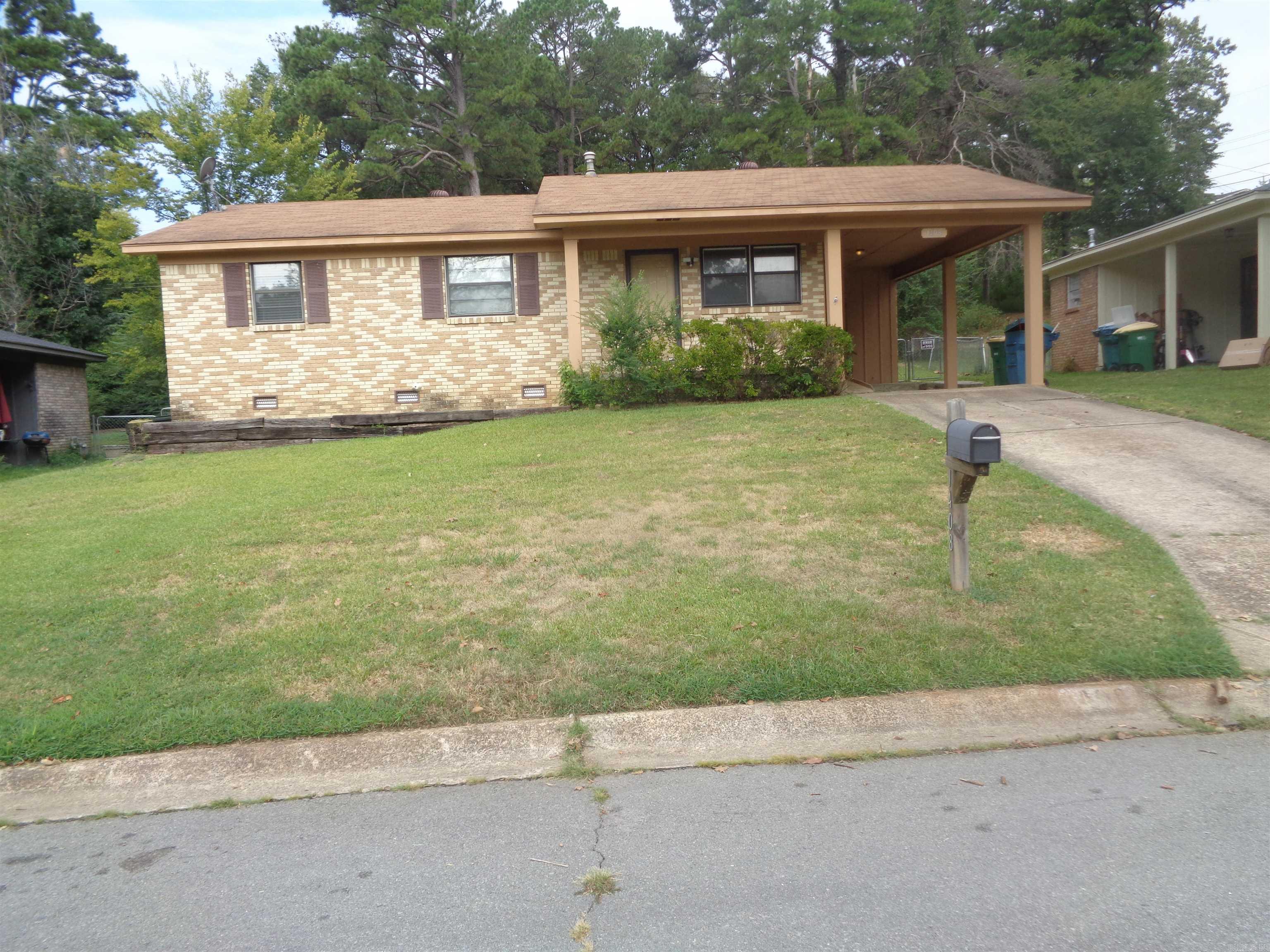 Just right "Starter Home" or if you are downsizing and need something nice. Clean 3 bedroom, 1 & 1/2 bath brick home on a very large lot. You will enjoy sitting in the sunroom looking into the spacious backyard.