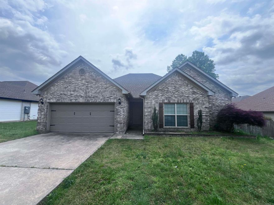 Nestled in the back of a quiet subdivision, this all brick 3 bedroom, 2 bathroom house has everything you need and more! When you walk in the front door you are immediately greeted to a large living room with high ceilings, luxury vinyl plank flooring and a fireplace with mantle. The kitchen has white cabinetry, lots of storage, and the refrigerator is included! The master bedroom and bathroom have dual closets, dual vanities, a soaker tub and a walk-in shower. Not to be outdone by the inside of the house, the backyard has a large deck overlooking a wooded field. Enjoy the sounds of nature as you start your day or relax in the evening. The house is perfectly located for quick access to LRAFB, Searcy and Conway! Act quickly to turn this house into your home! **Edge Realty is proud to offer deposit-free living to qualified renters through Obligo! We understand that moving costs can add up, so we want to extend financial flexibility to our residents. Learn more about the benefits of deposit-free living with Obligo at www. myobligo. com.