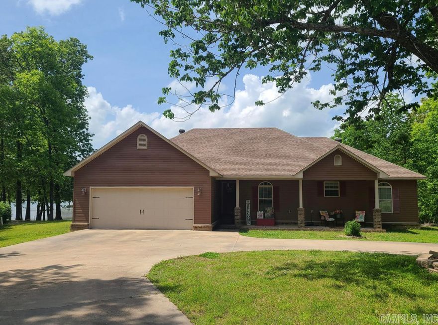 JUST IN TIME FOR THE SUMMER!!!  Crown Lake Water Front Home is sitting on 2 Lots!  This home was built in 2011, all one level with a 900 Sq Ft detached insulated workshop and a concrete circle drive.  A friendly and level lot with a gorgeous yard leading right down to the water.  This home has a nice open feel, with beautiful flooring, crown molding, custom cabinets, a nice laundry room, front and back porch, a boat dock, and all this tucked up in a cove for privacy!  Sit anywhere in your yard and overlook this gorgeous lake, feel the breeze from the water!   CROWN LAKE is over 600 acres of water!  STUNNING LOCATION SURROUNDED BY 5 LAKES WITHIN 10 MILES.  WE HAVE FARMER'S MARKETS CLOSE, GREAT FAMILY-OWNED RESTAURANTS, A NICE, CLEAN GROCERY STORE, A GOLF COURSE, AND MORE!  HERE YOU CAN GO FISHING WITH FAMILY, SWIM IN LAKES, VISIT CAVES, ETC.