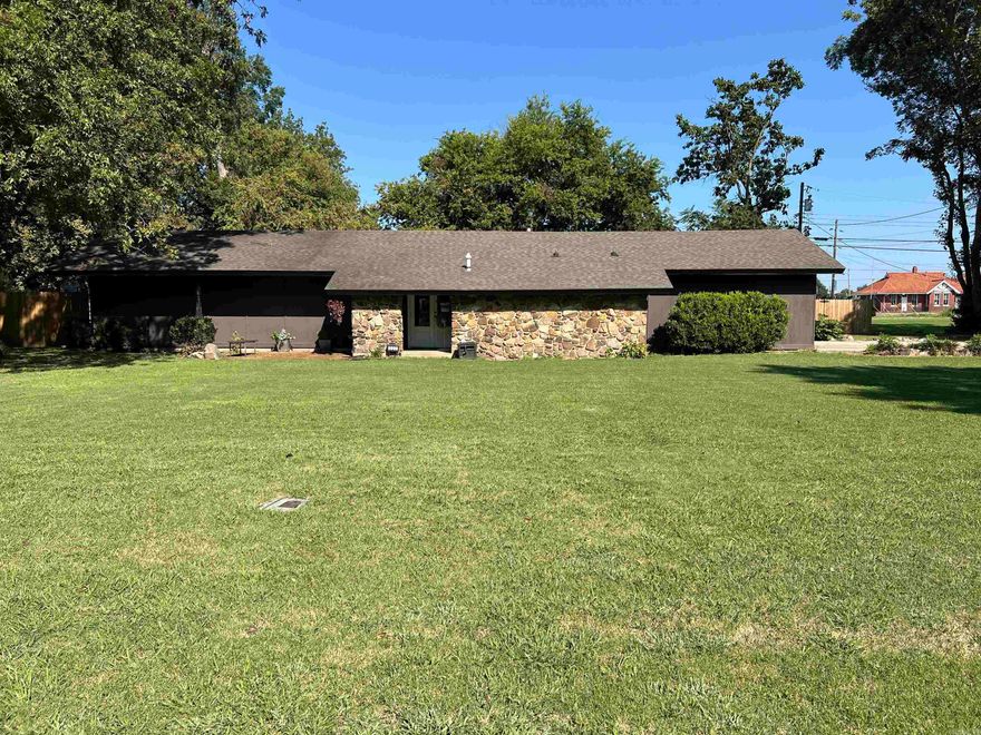 Walnut Ridge Dream Home! Are you in search of a charming and exceptionally lovely home? Look no further, as this one has everything you desire. It boasts beautiful curb appeal as you approach the driveway. Upon entering the front door, you are welcomed by a cozy sitting area currently utilized as an office space. To the right, there is a stunning kitchen equipped with lovely cabinets and butcher block countertops that seamlessly flow throughout. Adjacent to the kitchen is a spacious laundry room with ample concealed storage. Here, you will discover a half bath featuring a distinctive antique metal sink and attractive tongue and groove ceilings, creating a modern rustic charm. Turning left from the entrance leads you to a remarkable space suitable for a play area, formal living space, or lounge. This area features unique ceilings, abundant natural light, and a beautiful rock fireplace, creating a warm and inviting atmosphere with its natural lighting and neutral earth tones. Stepping out the back door, you will be delighted to find a spacious yard with an in-ground pool, transforming this home into a serene oasis of relaxation. Call today before its gone tomorrow!