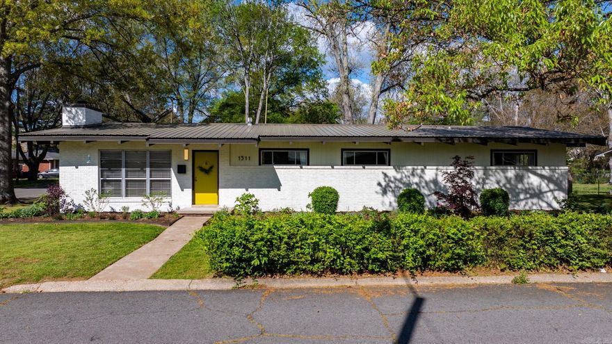 Welcome to a truly unique and one-of-a-kind home that seamlessly blends mid-century charm with a family-oriented atmosphere! This exceptional residence features two spacious living room areas that offer versatility and comfort. As you walk in, a large picture window floods the interiors with natural light, accentuating the vaulted ceilings and creating an airy and welcoming ambiance. The open kitchen featuring SS appliances is combined with a dining combo that makes it perfect for gatherings and family meals! For those working from home, a traditional office room provides a quiet and productive space. Step outside to discover a large patio, firepit and fully fenced oversized yard that is ideal for outdoor activities and relaxation. A convenient storage room is attached to the carport, ensuring ample space for all your belongings. Safety and peace of mind are paramount, with a storm shelter just steps away from your back door. Situated within walking distance from Conway High and Ida Burns Elem, this home combines convenience with a serene and family-friendly neighborhood setting. Don't miss out on the opportunity to call this exceptional property your own