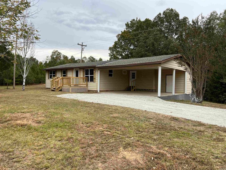 If you're looking for a slice of country-living experience on approximately 6+/- acres out of town on a paved road, here's your opportunity! This home features many updates, including a new Trane HVAC system, roof, windows, cabinets, countertops, flooring, doors, light fixtures, front and back decks, and so much more. A true unicorn for the price  now's your chance to contact your realtor for a showing before it's too late!