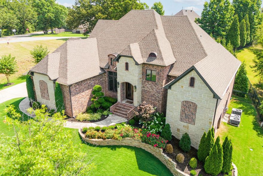 Welcome to luxury living at Sloan Lake Estates, located in the prestigious Valley View School District and Ridgepointe Country Club. This residence seamlessly blends modern elegance with timeless design, ideal for both hosting and privacy. The inviting open floor plan centers around a chef’s kitchen with quartz countertops. The master retreat includes an office, private patio, and a luxurious bath with a soaker tub, double vanity, heated floors, and walk-in closet. A guest bedroom with an updated bath is on the main level, while the finished basement features a living area, kitchenette, guest room, full bath, and golf-cart garage. Upstairs, find two bedrooms with a jack-and-jill bath and an oversized versatile bedroom. Energy-efficient features include closed-cell foam insulation, tankless water heaters, and Nest thermostats. A sophisticated security system and iron-fenced backyard with Giant Arborvitae trees ensure privacy and safety.  Contact us today for a private tour!