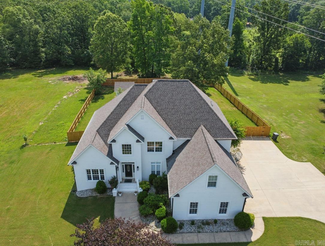 Move-In-Ready Showstopper at 1518 Brookshire, Benton AR Welcome to the worry-free home you’ve been hunting for! A brand-new architectural roof (2020), fresh exterior paint & seamless gutters (2023) greet you at the curb, setting the tone for the top-to-bottom upgrades inside. Step into sun-splashed living spaces that flow effortlessly toward a spa-worthy primary bath, completely reimagined in 2025—think frameless glass, designer tile, and double-vanity storage. Love peace of mind? You’ve got it: Dual high-efficiency HVAC systems installed in 2022 and 2024 Brand-new water heaters for endless hot showers Smart garage-door systems that glide open at a touch Privacy-perfect new fence (2025) enclosing a level backyard ready for pets, play sets, or a future pool Every big-ticket item is DONE—just unpack and start living! Homes this turnkey don’t last—book your private showing today and claim 1518 Brookshire before someone else does!