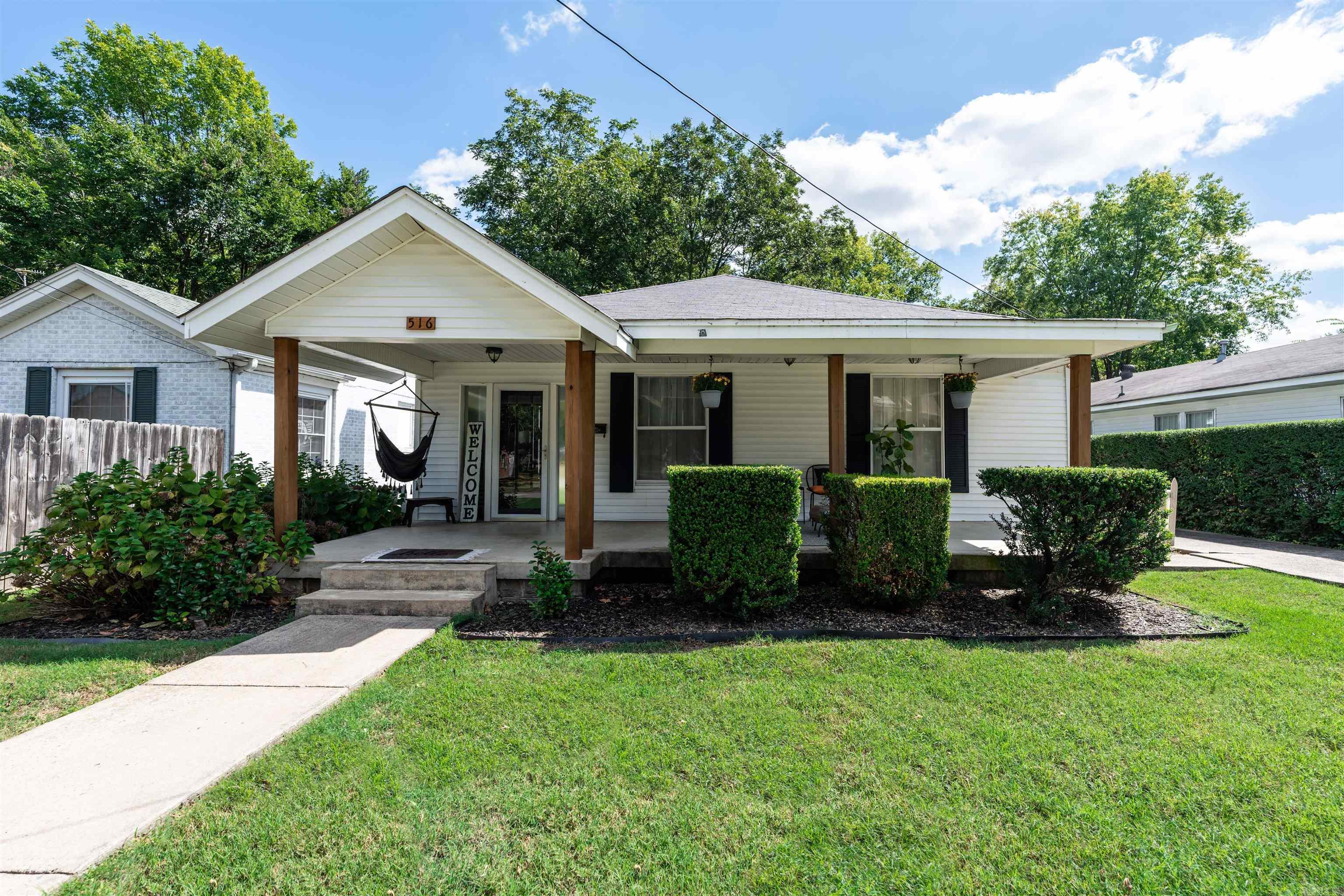 Discover the charm of this home in Old Town Conway! Featuring 3 spacious bedrooms and 2 bathrooms, this residence exudes historic elegance with its original interior doors and wide trim. The bright living area seamlessly connects to the dining and kitchen spaces, leading to a private deck perfect for outdoor relaxation. Fresh paint and modern light fixtures enhance the inviting atmosphere and the guest bathroom has just been renovated. With a recently encapsulated crawl space and a fully fenced backyard, plus a convenient shed at the driveway's end, this property offers both comfort and functionality. Schedule your showing today! Agents please see remarks.
