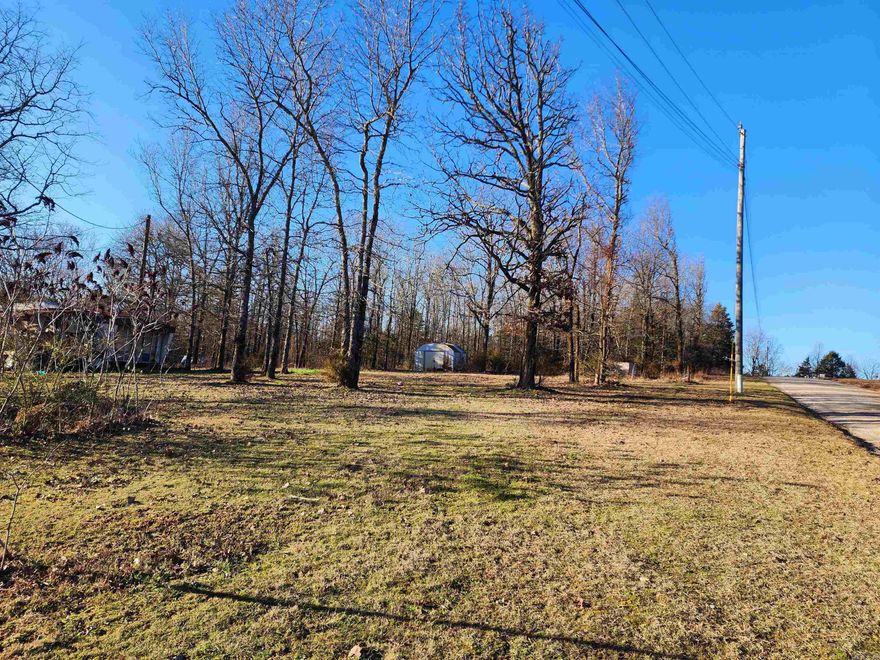 5.11-acre lot with utilities ready to go! The land is unrestricted, so you can build your dream home, whatever that may look like to you! There is an old trailer that conveys at no value.