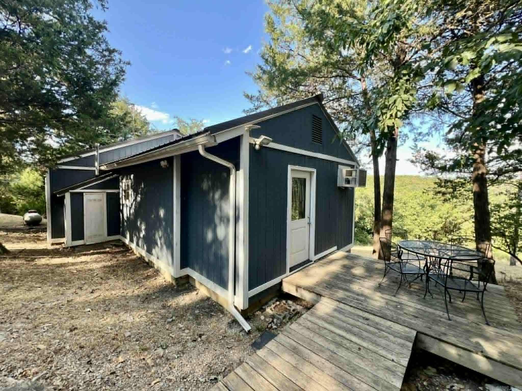 Look no farther! Price to Sell! This Cute Country Home on 24 acres M/L is located in Henderson, Arkansas & is only 3 miles to Lake Norfork & Lake Norfork Marina. Home is ready to move into & comes fully furnished. Plenty of space inside and out to enjoy family & friends, with a large deck to enjoy the Sunsets and a fire pit area to make smores afterwards. Not to mention your own Land to hunt right out your back yard and into the woods! In the shed owners are leaving a few items including a 4/wheeler to make it easier to scout the trails throughout the woods. Under the home you can access the house very easily for utilities and also a small work area. Metal roof 2020.