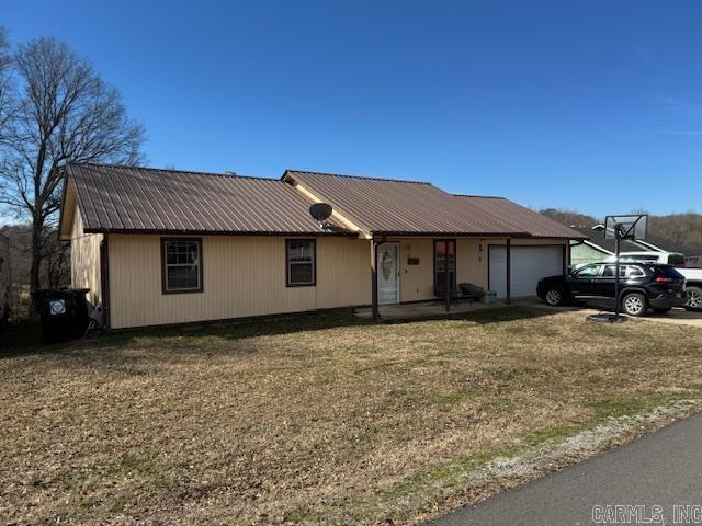 NICE 3BR, 2BA W/GARAGE!! This home is very clean and very nice and priced to sell fast! Home has living room, kitchen, dining combo. 3 bedrooms and 2 bathrooms including a master suite with private bath and closet. Features laundry closet, 2 car garage, LVP, 2 year old central heat and air, lots of cabinets and pantry and a metal roof. Kitchen appliances included are stove, refrigerator, microwave, dishwasher and garbage disposal. Built in 2000 with 1092 square feet of living space plus 465 square foot garage. Sitting on .33 of an acre on a nice quiet street!