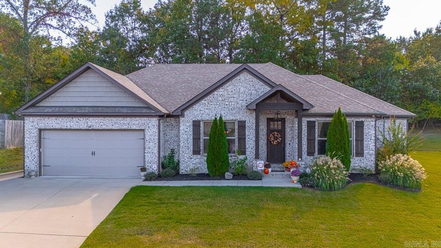 Picture Perfect Home Located in the Heart of Benton... Amenities include: Approximately 2023 Square Feet +/-, 3 Bedrooms, 2 Bathrooms, Split Bedroom Floorplan, Kitchen / Dining Combo, Living / Dining Combo, Great Room with Gas log fireplace, Wood Beams in Living area and Primary Bedroom, Separate Dining Room, Custom Tile Shower and Separate Free Standing Tub in Primary Bathroom, Wood Flooring throughout home, Tile in Wet Areas, Laundry Room, Breakfast Bar, Covered Rear Patio, Generator, Large Cul-de-sac lot that backs up to woods, 2 Car Garage, Benton Schools, And Much More.... A Must See.....