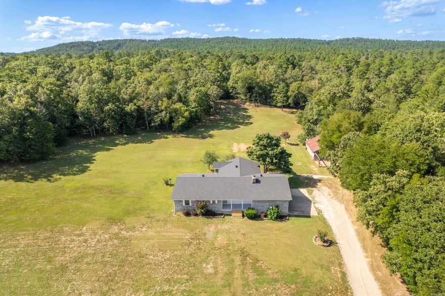 Tucked away in a peaceful, tree lined setting and backing up to the National Forest, this well maintained home offers the perfect blend of privacy, space, and comfort. This home features generously sized bedrooms, two living areas, a large laundry room with plenty of storage, and a 26x34 shop. Conveniently located to Lake Hamilton, Lake Ouachita, and Lake Hamilton schools. Whether you're starting out, slowing down, or somewhere in between- this is the kind of place that feels like home. Call today to schedule your showing! *Wheeler Ferry is scheduled to be repaved this summer.*