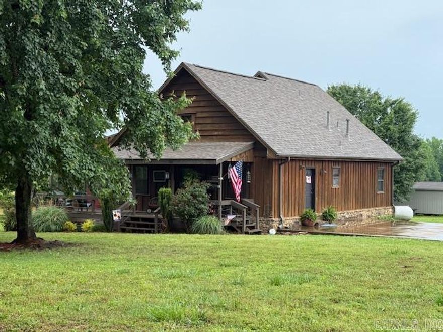 OUT, BUT NOT ''FAR OUT!'' This CHARMING 3-bedroom, 2-bath cabin with 34.80 ACRES is a RETREAT for all SEASONS! When you enter, the warm, cozy living room says, ''STAY A WHILE.'' Country kitchen has big city ways with a pantry, island, gas stove and ample working space. The open concept floor plan will make the living room the fun center for you and your guest! 2 bedrooms and a full bath are located on the main floor, both spacious in size. Upstairs provides an additional bedroom and bath. Shingles replaced in 23' and HVAC in and updated engineered hardwood on the main-floor. Enjoy WIDE OPEN SPACES? Almost 35 acres of pasture with a stocked pond make this property PEACEFUL and PERFECT! Let's talk DETAILS!