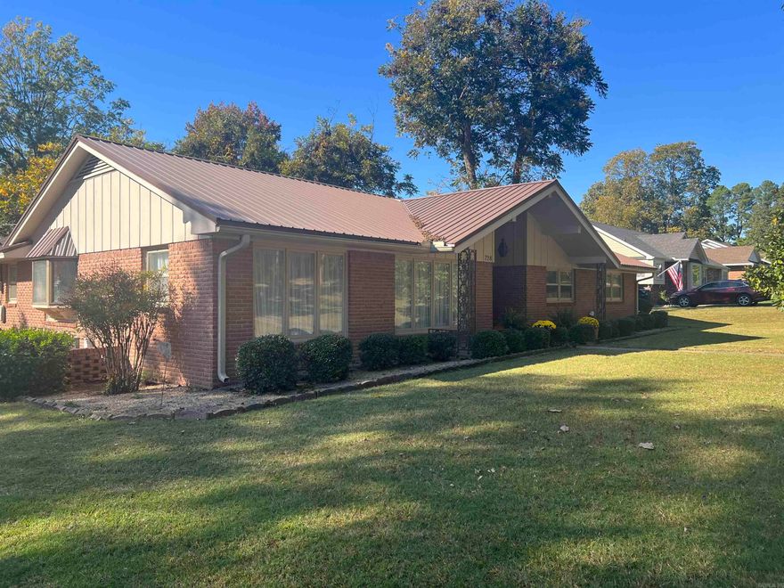 Welcome to this IMMACULATE 3 bedroom, 2 1/2 bath, 1756 sq ft home! It sits on a .33 corner lot with a beautiful yard and several pecan trees. The front entryway is inviting and has a beautiful stained glass front door. Upon entering the home you will appreciate the open concept layout, with the living/dining rooms adjoining, as well as the family room/kitchen. The living room and family room have built in shelving. The kitchen is light and bright and has a bay window allowing lots of natural light. There's an abundance of cabinets and counter space making meal prep a breeze. The kitchen has stunning stained glass cabinets, a breakfast bar, and a NEW COOKTOP! Appliances do convey. Off the kitchen is a half bath, and  laundry area. This home has NEW FLOORING, and a NEW ROOF. Off of the family room there is a beautiful patio area with wrought iron railing adding lots of character and charm to the space. This is the perfect outdoor entertaining space. Enjoy sitting outside with family and friends and enjoying the beautiful outdoors. There's extra parking allowing guests adequate parking spaces.  It is MOVE IN READY, and located in a beautiful neighborhood and a convenient location!!!