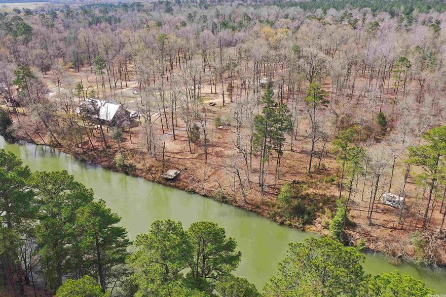 Little Missouri River property!! Park like setting on this 5.6+/-  acres with 200+ feet of river frontage. Perfect spot for a getaway cabin or home. Near Lake Greeson and the Diamond Mine.